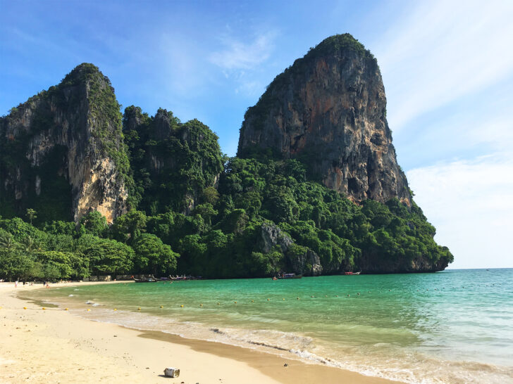 famous thailand beaches view of karsts alongside beach with teal water in Krabi Thailand