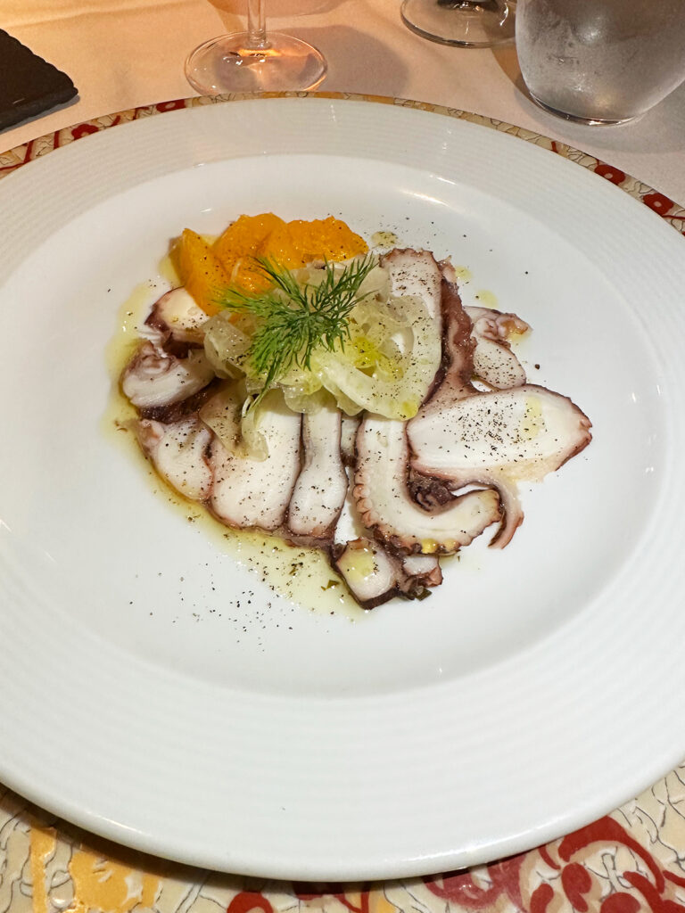 Celestyal Cruises Review octopus on plate with toppings and seasonings