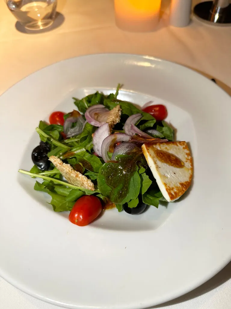 delicious salad with veggies and grilled cheese on a Celestyal Cruises Greek islands