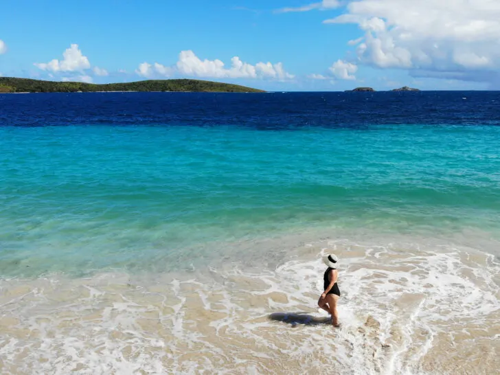 vieques or culebra Puerto Rico view of woman walking on beach with teal and blue water in distance
