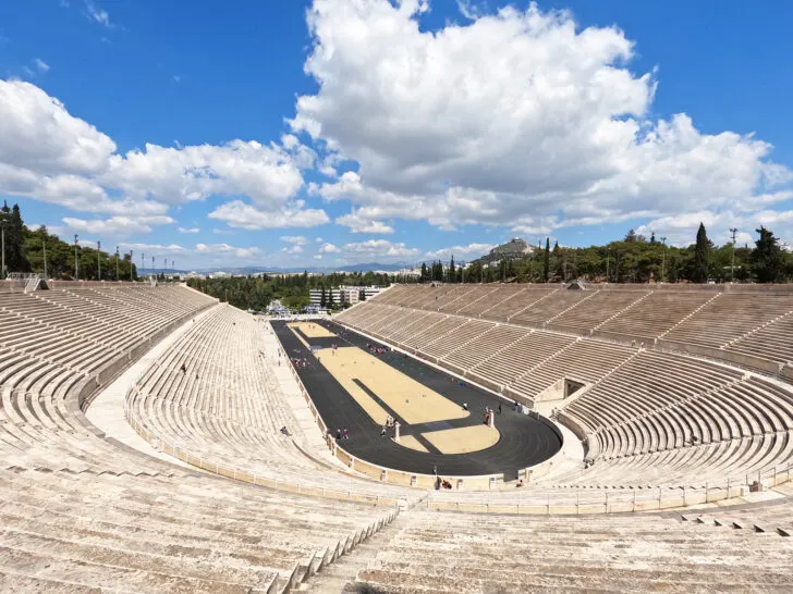 large stadium with track inside and marble seats