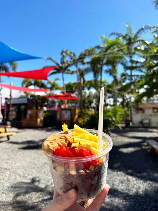 hand holding açaí bowl with fresh fruit things to do in Kihei Maui