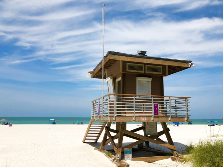 things to do Anna Maria island view of lifeguard tower with beach on sunny day