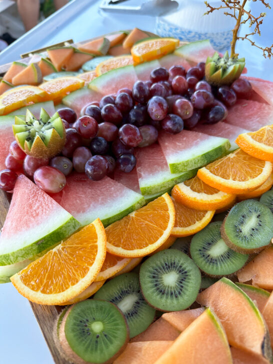 cut up fruit on tray on boat