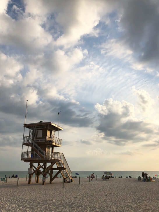 things to do in Anna Maria Island view of manatee beach at dusk with lifeguard tower
