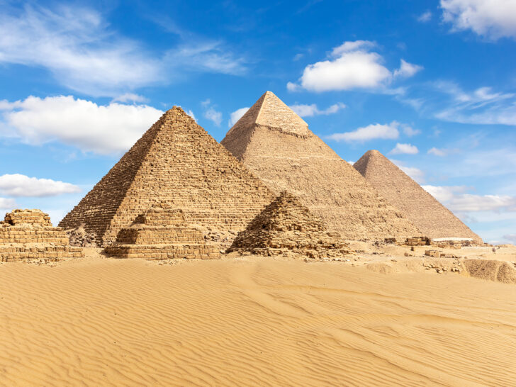 Cairo Egypt pyramids with sand and blue sky