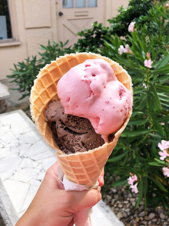 strawberry and chocolate ice cream in cone