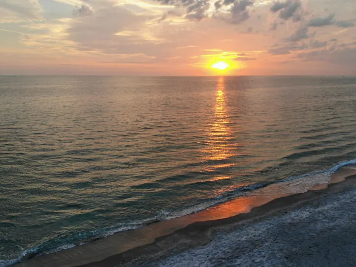 sunset over florida beach on Anna Maria Island bean point