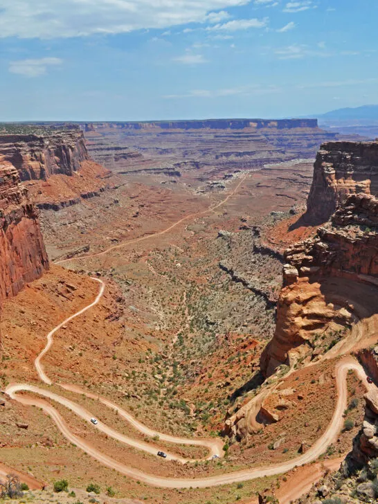 things to do in Moab with view of wild curving road through large canyon