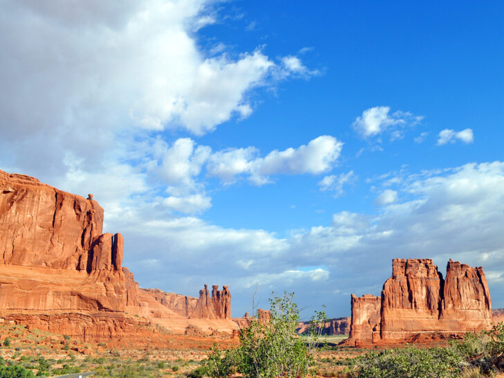 things to do in Moab view of Arches scenic drive with blue sky and rocky towers
