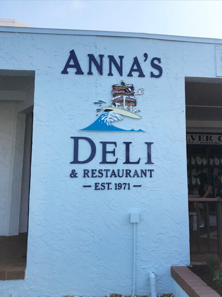 sign on the wall that reads annas deli restaurant est. 1971 in Siesta Key Florida