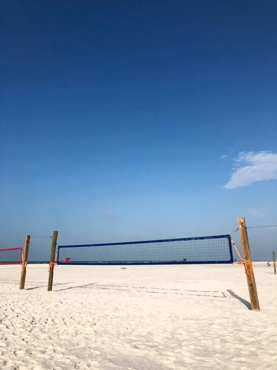 things to do in Siesta Key like playing sand volleyball with view of court and net