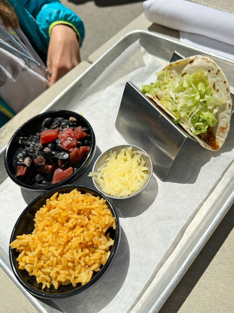 taco rice and black beans on tray