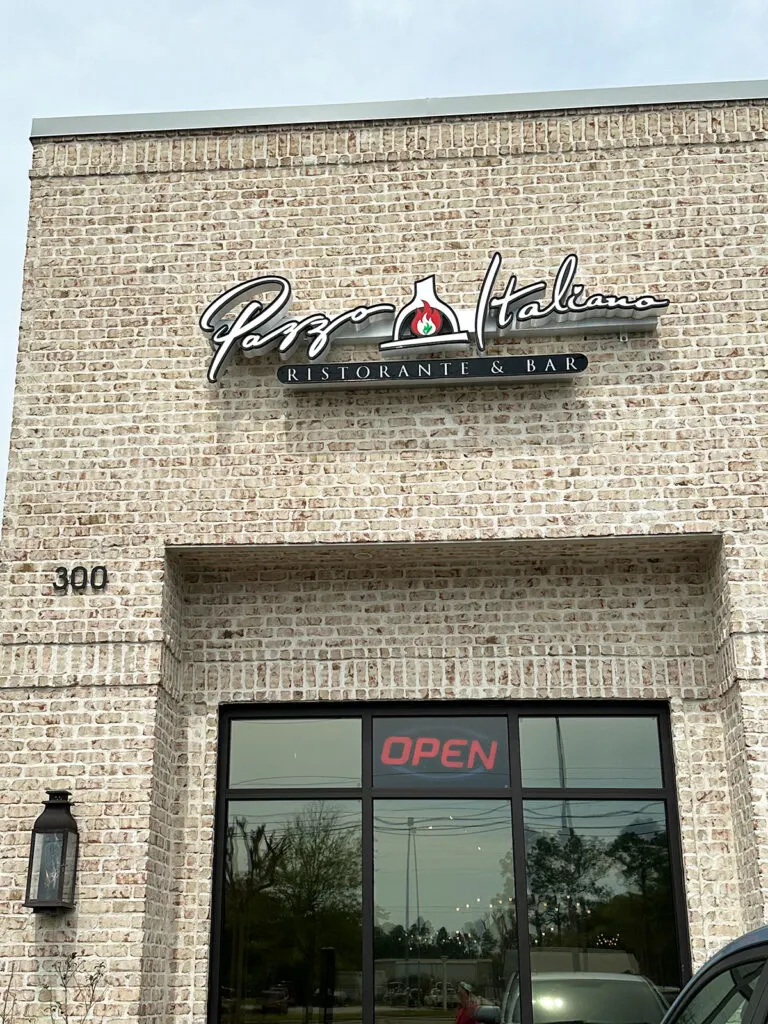 best restaurants in 30a view of front of building with Paavo Italiano sign