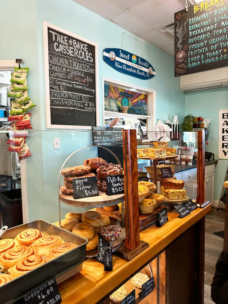 pastries and sweets on counter with menu at blue mountain bakery