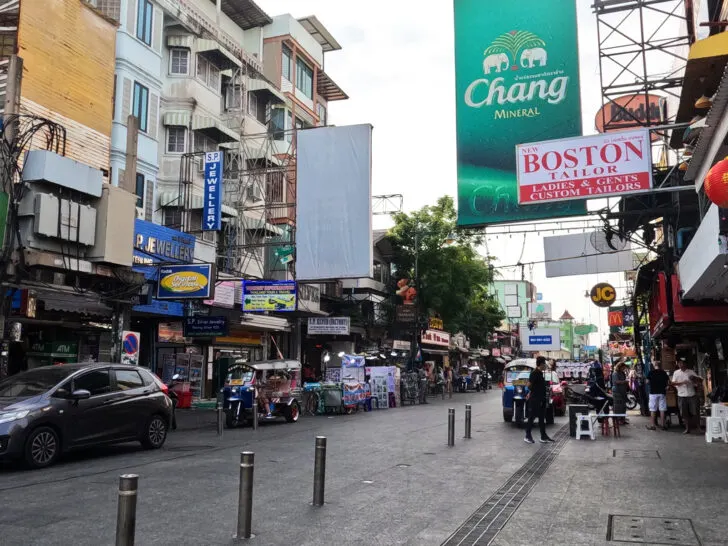 street buildings and signs with shops 2 day Bangkok itinerary