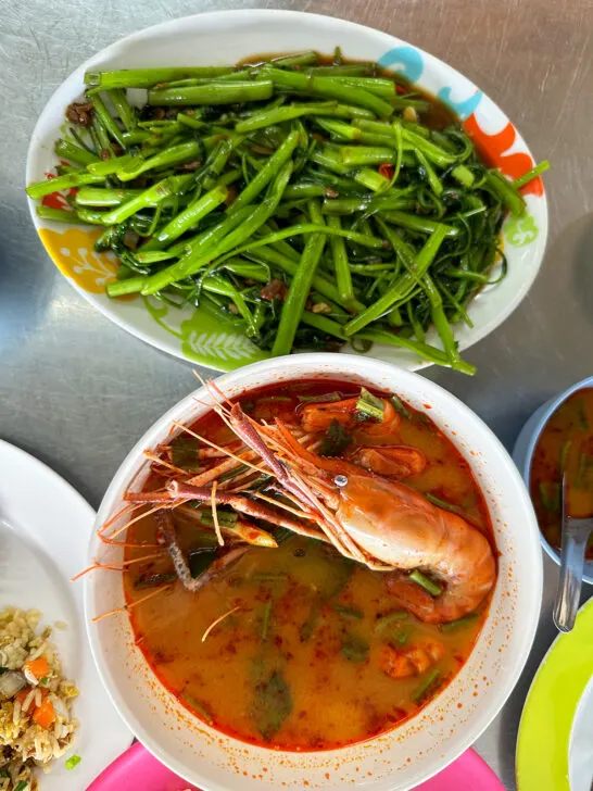 seafood soup and green salad in bowls what to eat during two days in bangkok