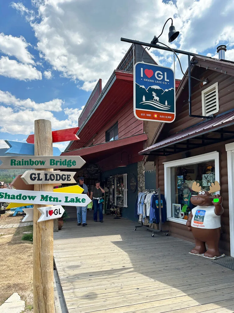 building and boardwalk with sign that reads I heart GL for Grand Lake Colorado