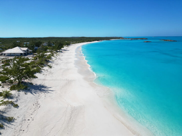 beautiful beach from above with teal water and white sandy beach