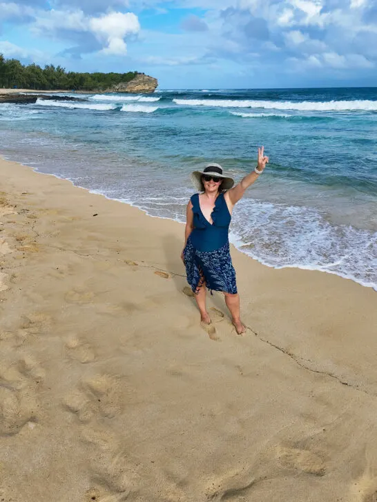 Nikki Rue drone pilot on beach in Kauai Hawaii