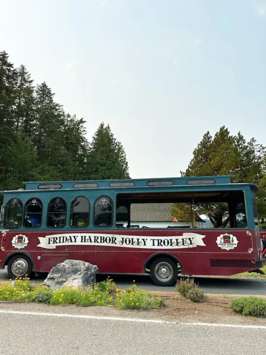 trolley with writing that reads Friday harbor jolly trolley