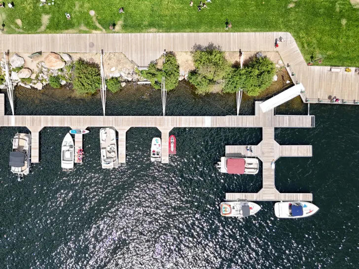 Colorado drone photo view of Grand Lake Marina view looking down at boats and boardwalk