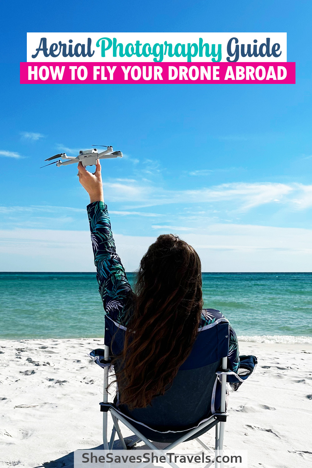 view of woman holding drone with ocean in distance with words aerial photography guide how to fly your drone abroad