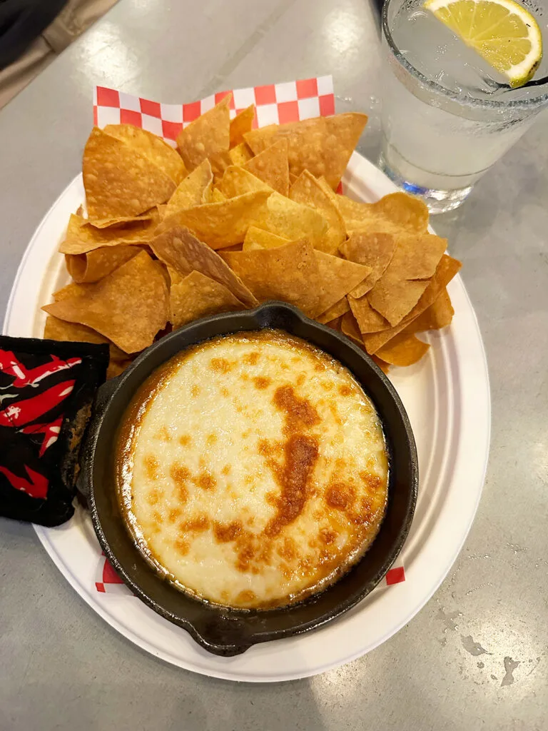 queso fundido with chips on plate at Don Tako in Old San Juan