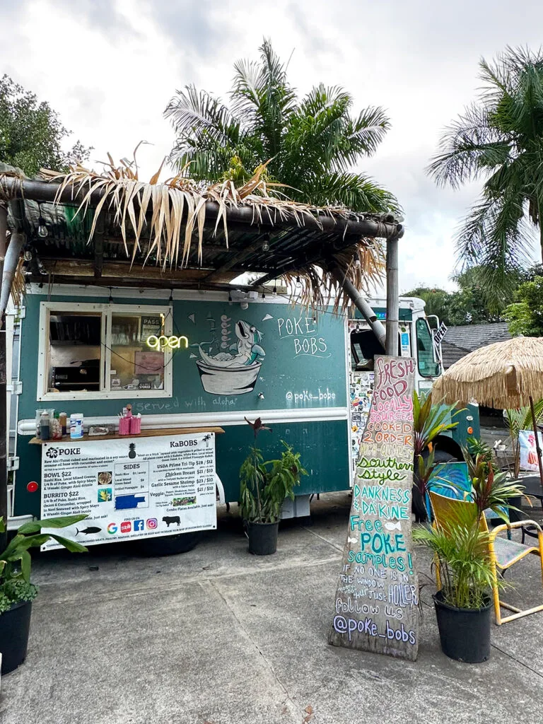 view of food truck with signs that says poke bobs best places to eat in Maui