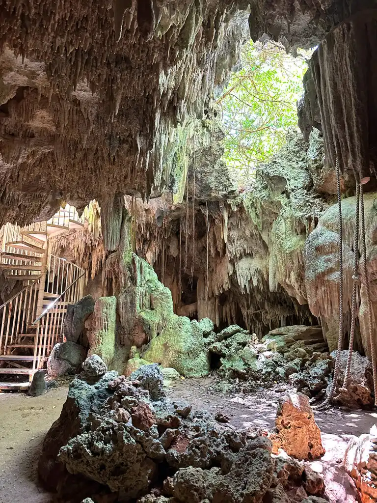 cave with stalagmites and stalagmites with steps in Grand Cayman