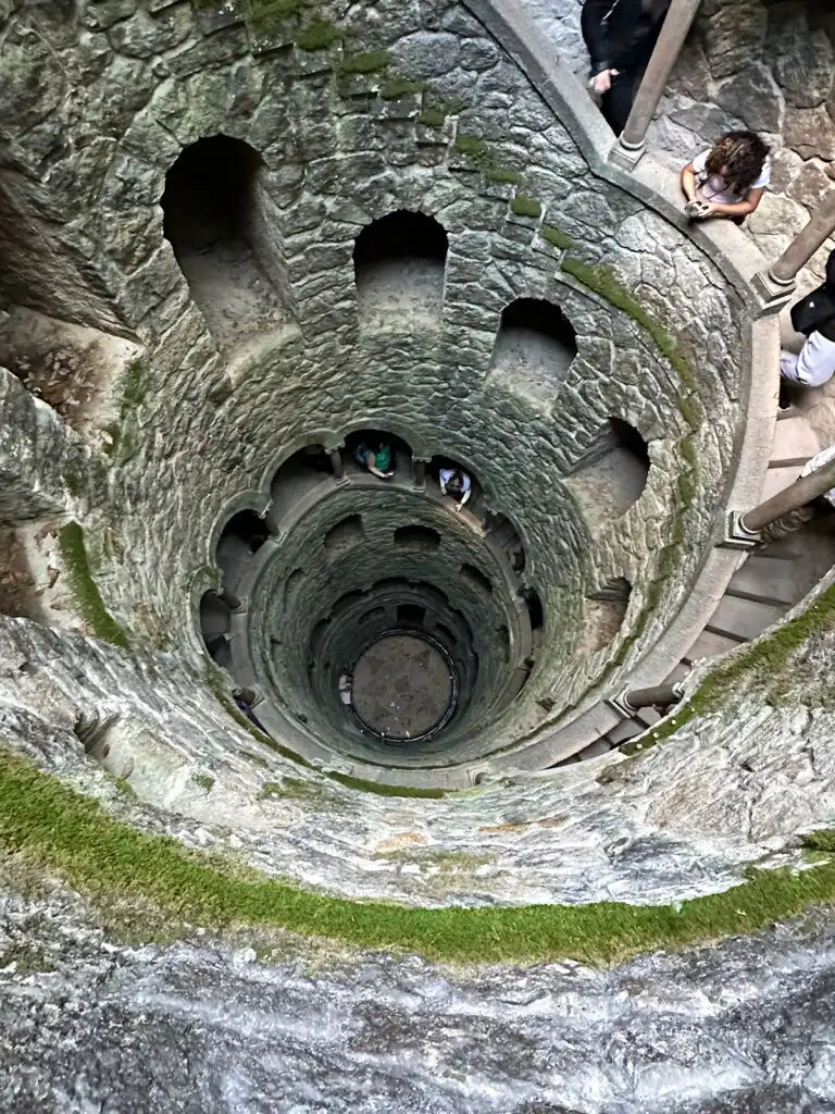 circular tower looking down with stone walls
