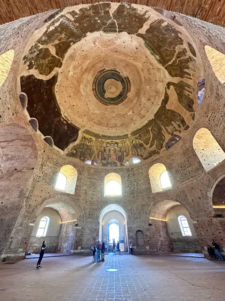 inside of the rotunda in Thessaloniki with large circle ceiling and windows