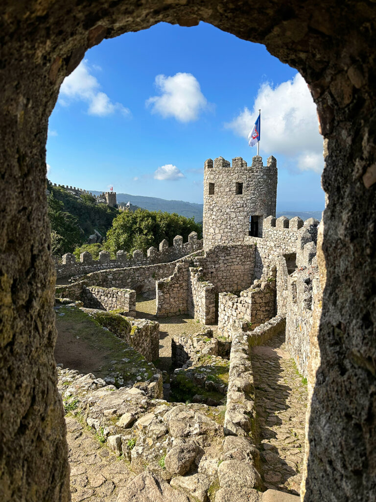 view of moorish castle with stone walls and flag