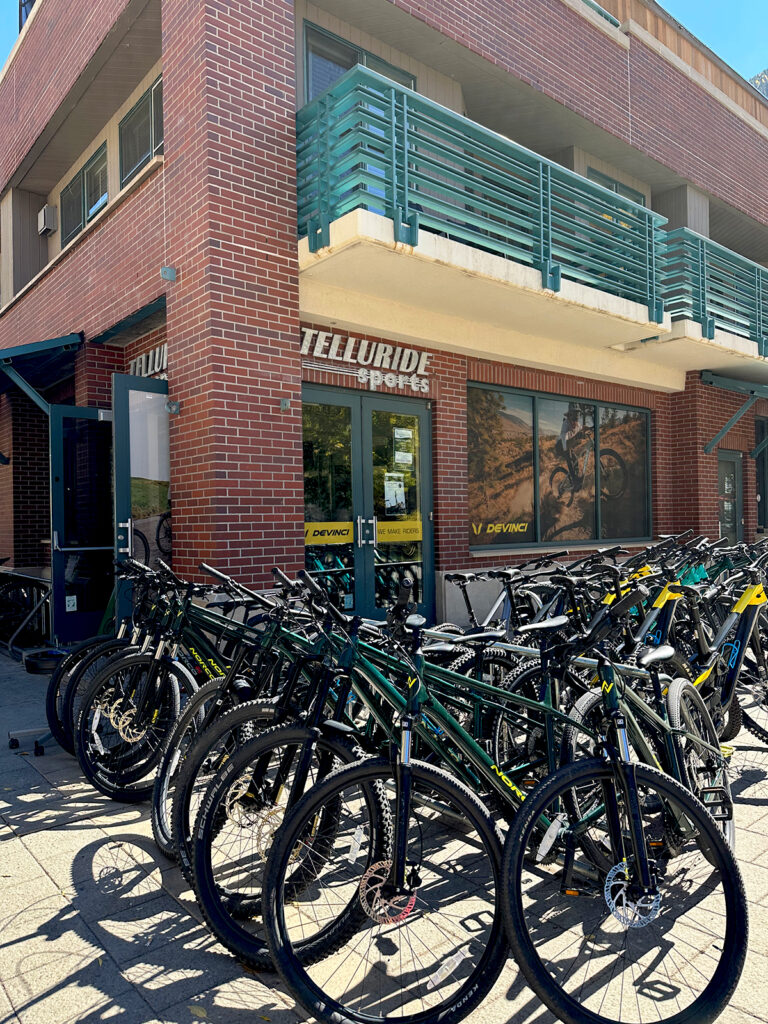lots of bikes lined up in front of Telluride sports shop