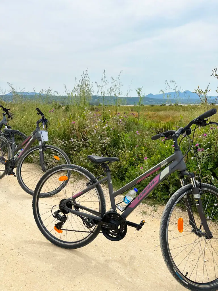 view of multiple bikes and field during a Greek vacation itinerary