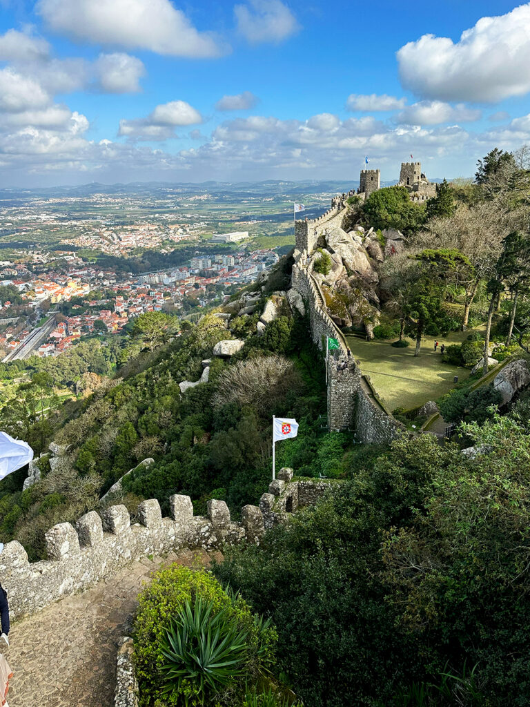 view of castle walls with land in distance