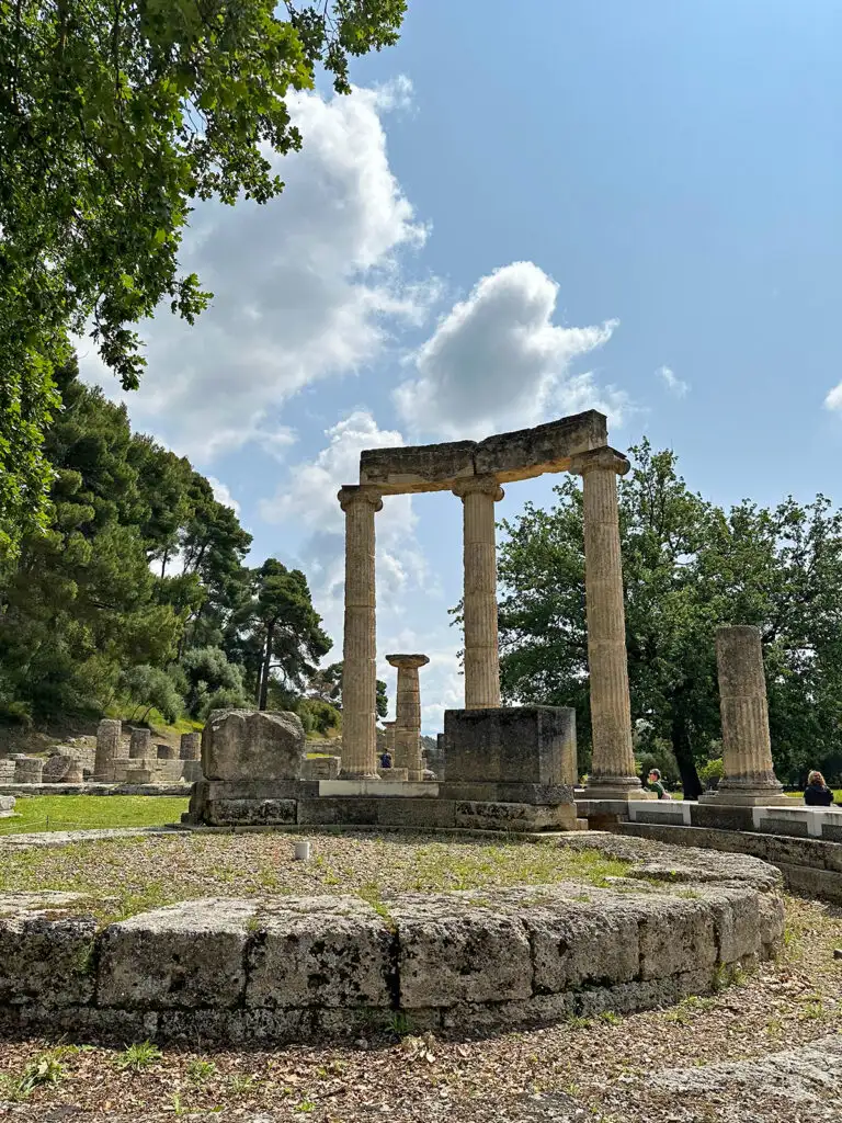 view of the sanctuary of Olympia stones and pillars on a Greece mainland itinerary