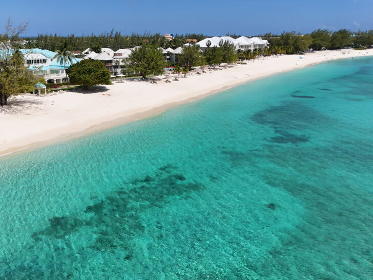 bright teal water with white sand in Grand Cayman