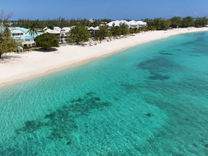 things to do Grand Cayman white sand beach teal water and condos