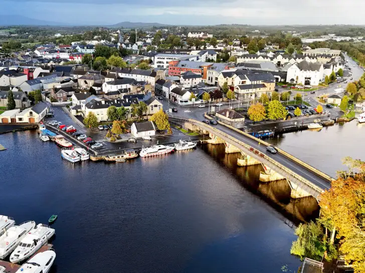 Co. Leitrim Ireland aerial view of River Shannon with bridge marina and buildings