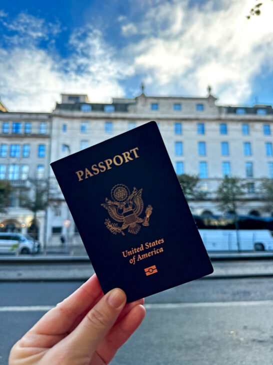 US passport with building in distance